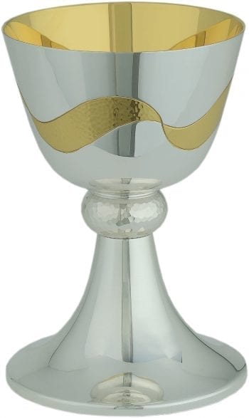 two-tone brass chalice in a contemporary style characterized by a hammered handle and a decorative motif on the cup