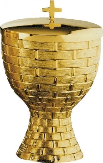modern pyx in cast golden brass with a very minimal line embellished with embossed interweaving