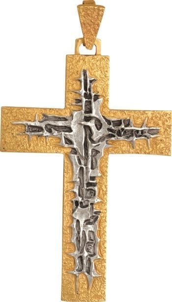 Croce pettorale stilizzata realizzata in argento bicolore interamente cesellata a mano con crocifisso stilizzato