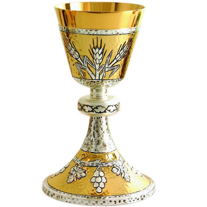 Modern chiseled chalice made of two-tone brass and entirely decorated with Eucharistic motifs