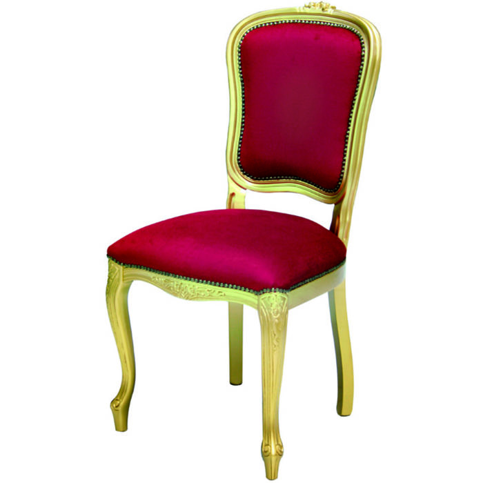 Baroque gold style chair decorated with handmade carvings and red velvet upholstery
