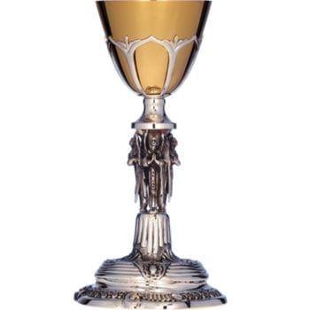 Calice " Angeli" in argento interamente cesellato a mano con figure angeliche a sbalzo cesellate all'impugnatura