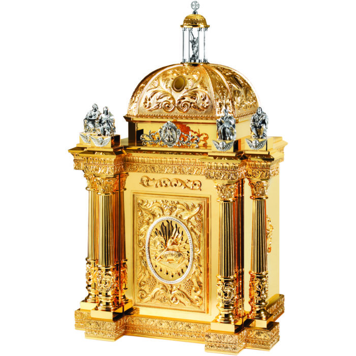 Baroque style brass table tabernacle decorated with Agnus Dei on the door, columns and dome surmounted by the four evangelists and St. Michael the Archangel