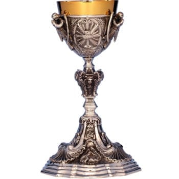 "Elevazione" chalice in two-tone silver in Baroque style chiseled by hand with Eucharistic motifs and angelic heads