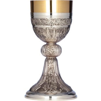 "Summer" glass in hand-chiseled silver in neo-Romanesque style and decorated with natural-like motifs.